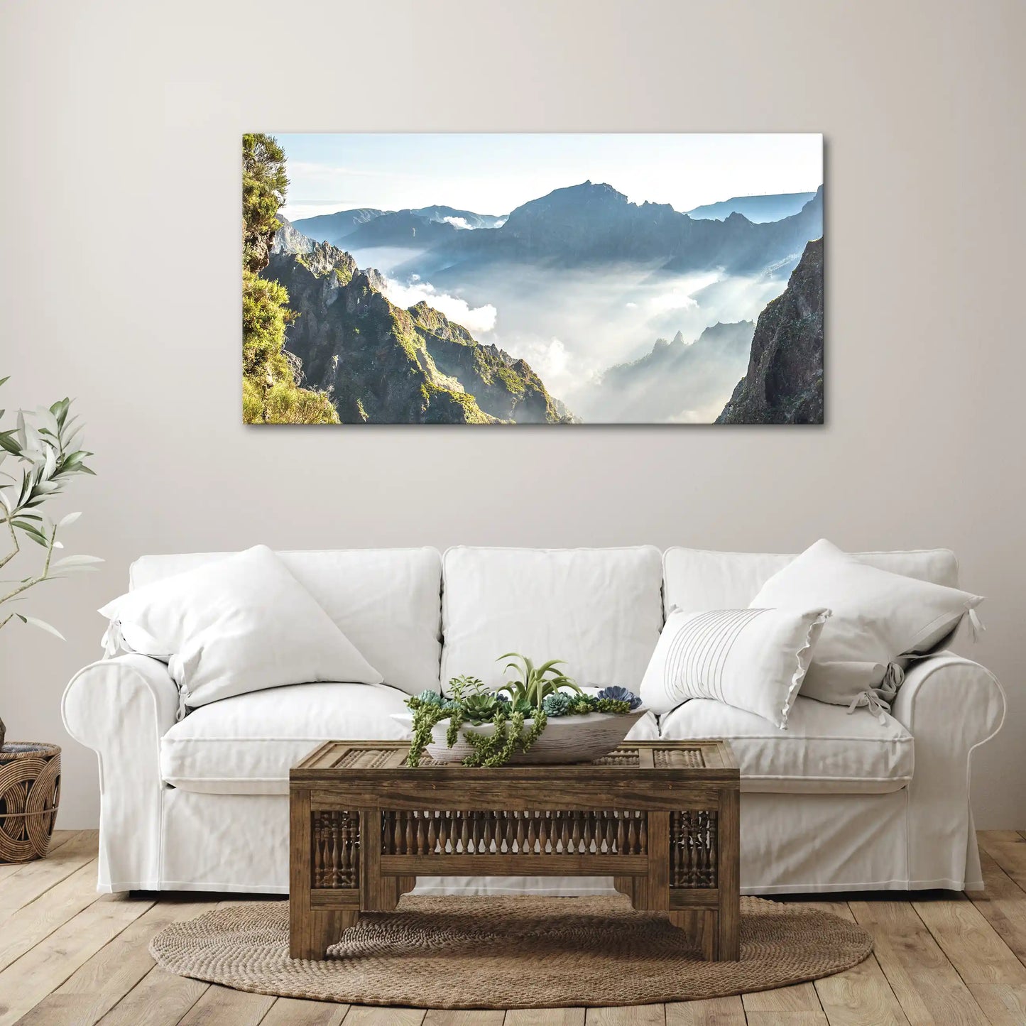 Leinwandbild Morgennebel mit Sonnenstrahlen auf Madeira