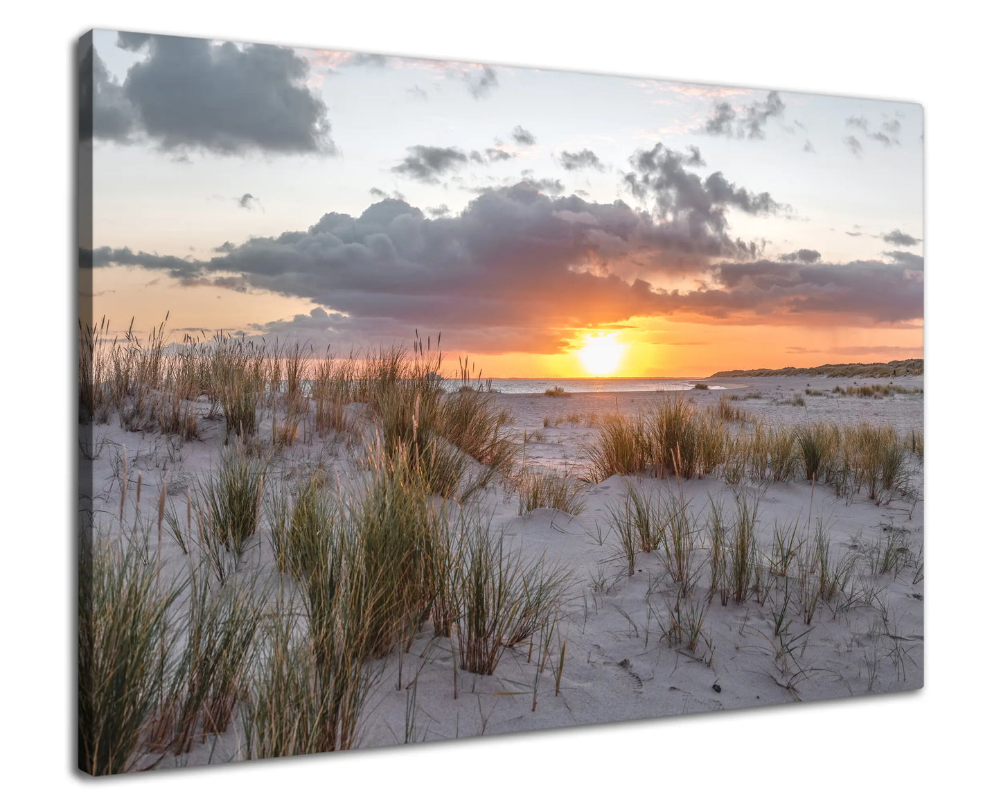 Leinwandbild Dünen und Strand am Meer bei Sonnenaufgang