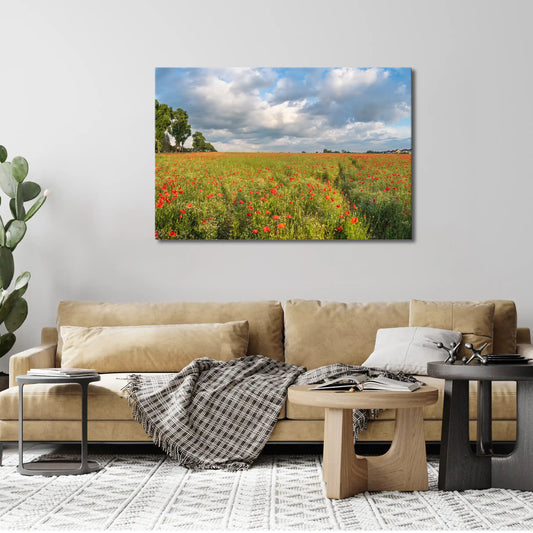 Leinwandbild mit rotem Mohn im weiten Blumenfeld