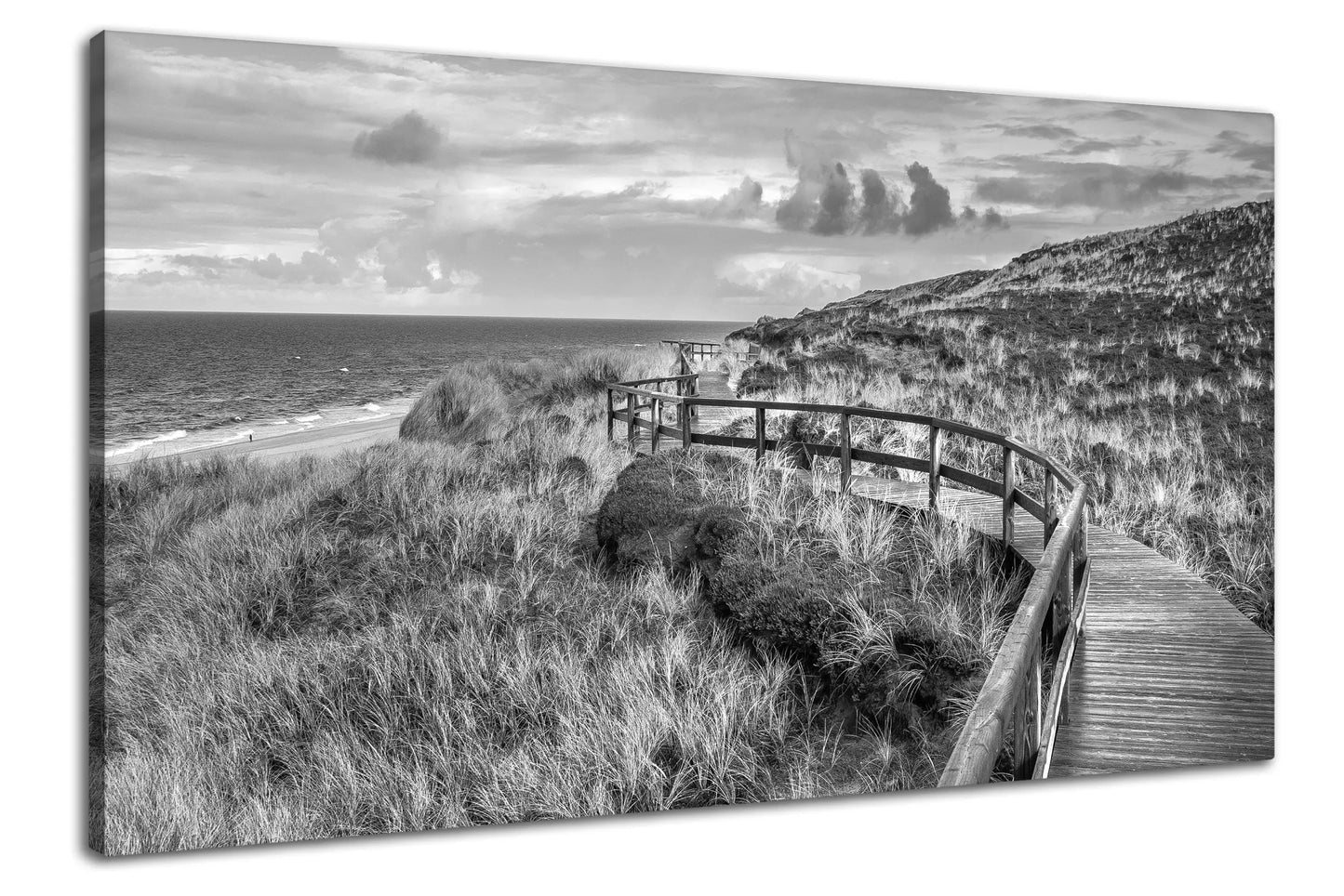 Leinwandbild Holzsteg in Düne an der Nordsee in schwarz weiß