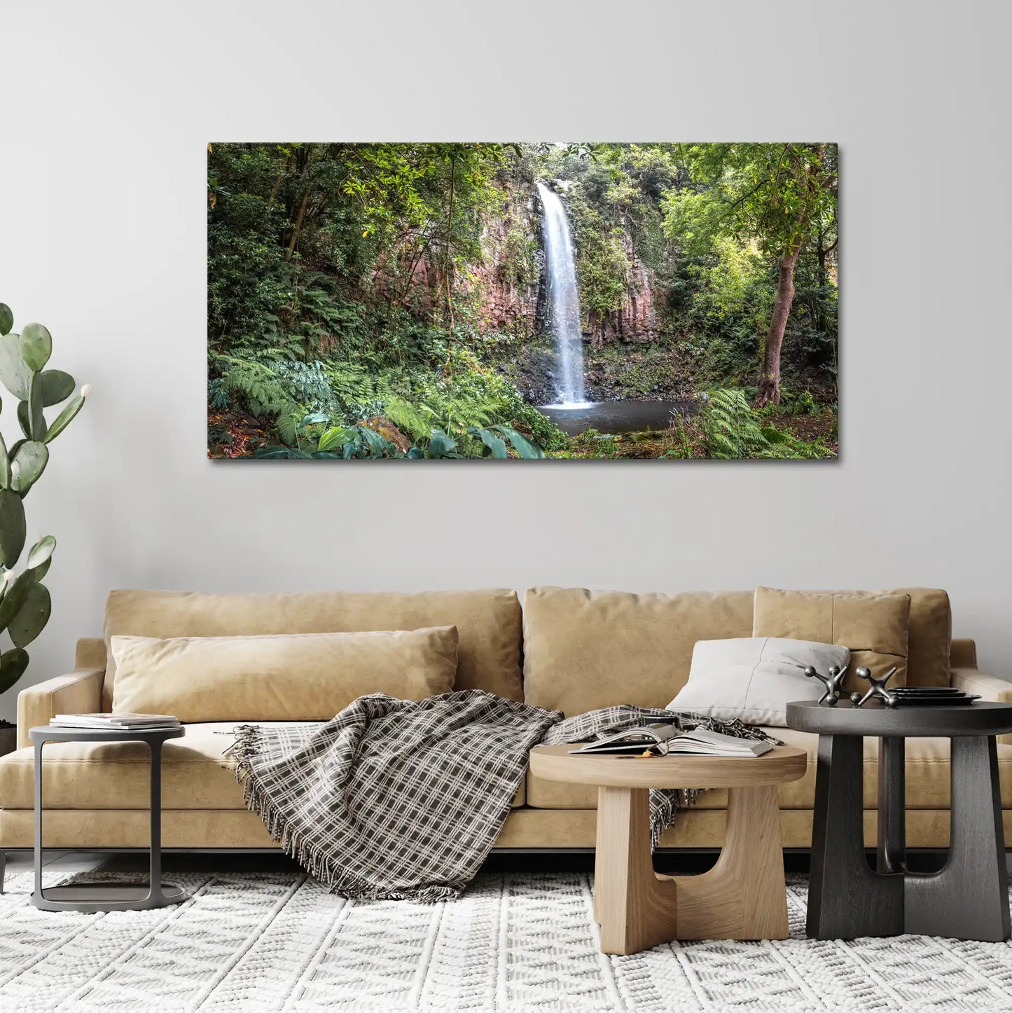 Leinwandbild Wald und Urwald an einem Wasserfall über Couch in Wohnzimmer