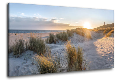 Leinwandbild Düne im roten Sonnenaufgang am Meer an der Nordsee