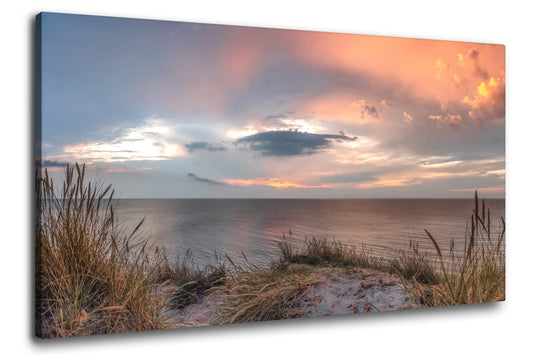 Leinwandbild Düne im roten Sonnenuntergang am Meer an der Nordsee